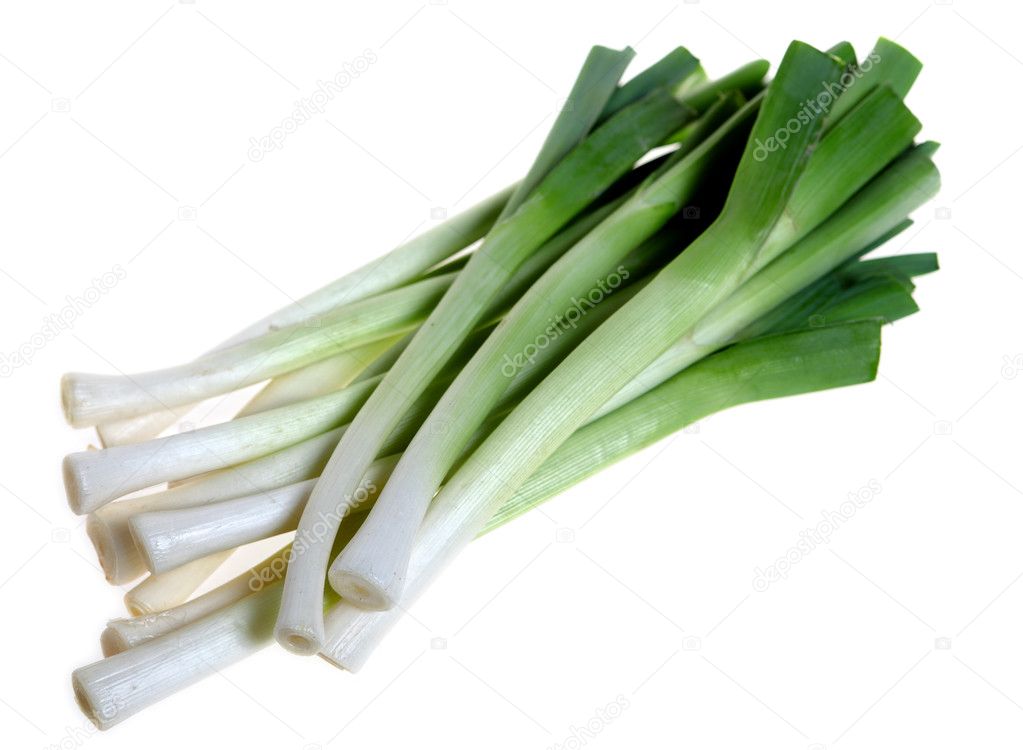 Young leeks isolated on white