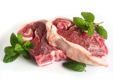 Two raw lamb chops over white clipart