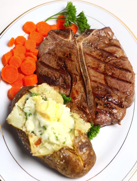 Porterhouse steak maaltijd bovenaanzicht — Stockfoto