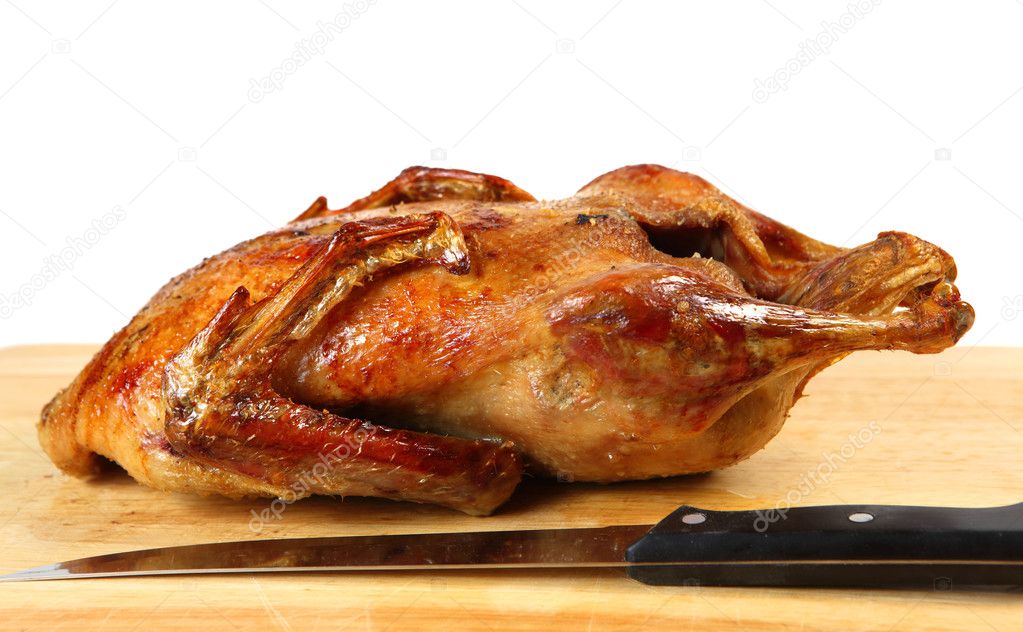 Roast duck and knife