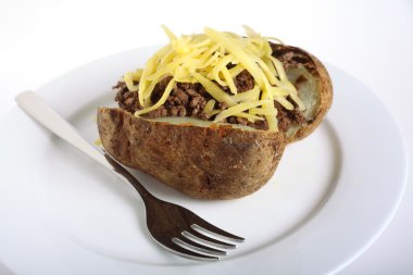 Jacket potato and fork clipart