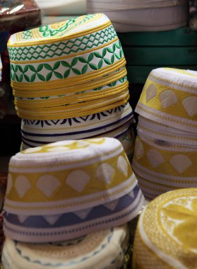 Prayer hats in Souq Waqif, Doha clipart