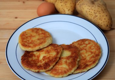 Potato pancakes vertical clipart