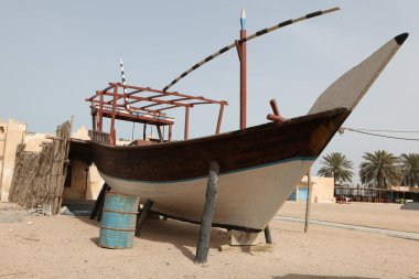 An old dhow under repair clipart