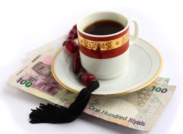Kaffeeperlen und Bargeld — Stockfoto