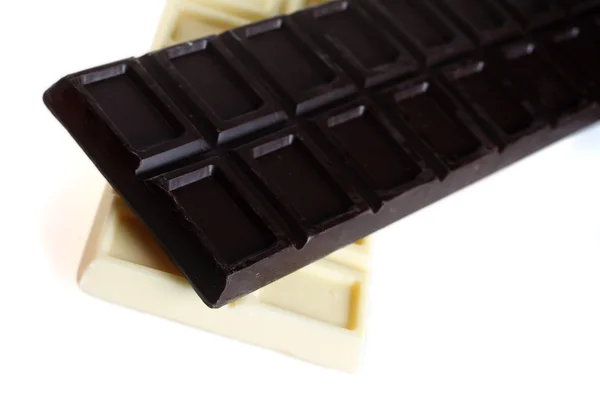 Dark and white cooking chocolate over white — Stock Photo, Image