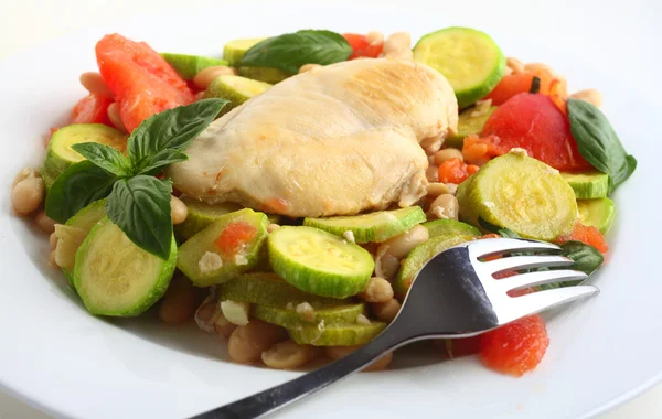 Italian chicken, with zucchini, beans and tomato — Stock Photo, Image