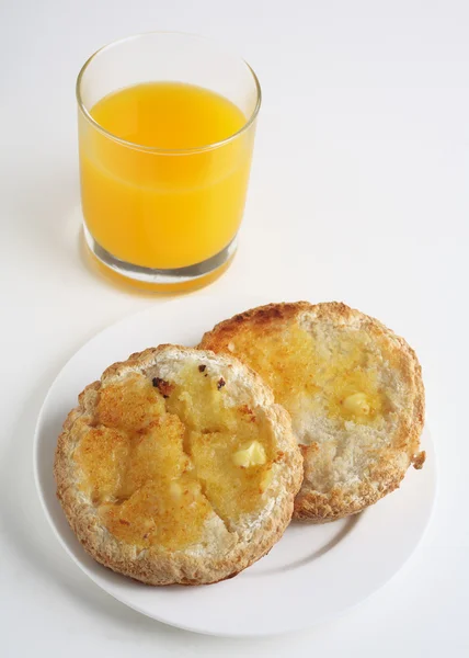 Gluten free toasted bread and orange juice — Stock Photo, Image