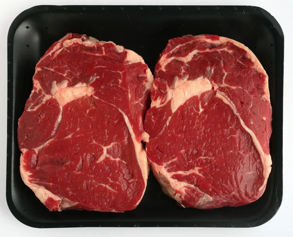 Twee steaks in lade — Stockfoto