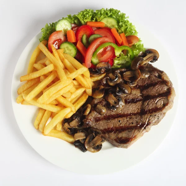Obiad stek Ribeye z góry — Zdjęcie stockowe