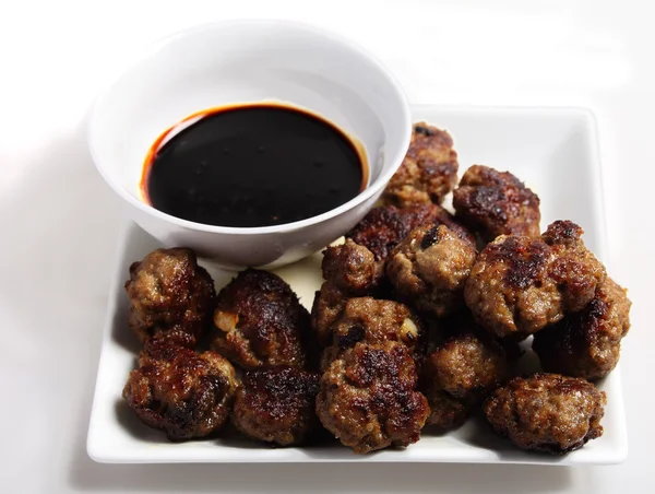 Meatballs and brown sauce dip — Stock Photo, Image
