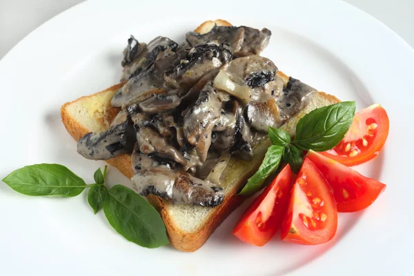 Toast with mushrooms in cream sauce — Stock Photo, Image