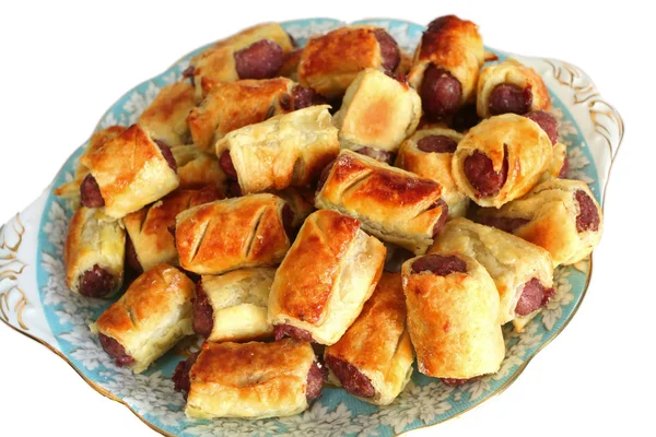 Plate of homemade sausage rolls — Stock Photo, Image