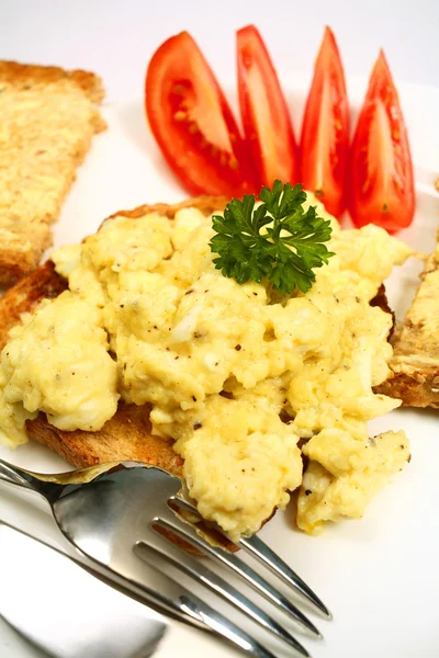 Scrambled egg on toast — Stock Photo, Image