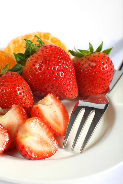 Strawberries with fork — Stock Photo, Image