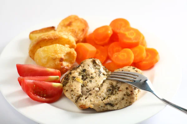 Herbed baked chicken breast meal — Stock Photo, Image