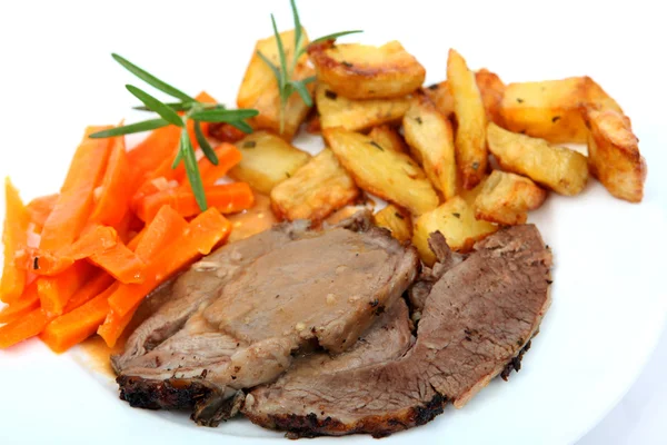 Roast lamb with potatoes and carrots — Stock Photo, Image