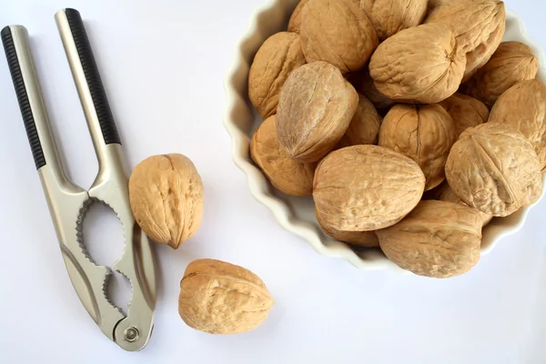 Nutcracker and walnuts — Stock Photo, Image