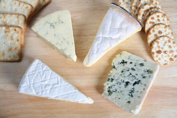 Four gourmet cheeses — Stock Photo, Image