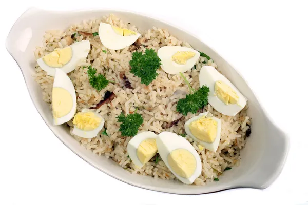 Kedgeree rice with eggs and parsley — Stock Photo, Image