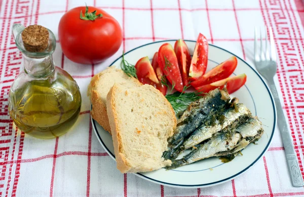 Sardines with tomato and bread — Stock Image Sardines with tomato and bread Royalty Free Stock Photos
