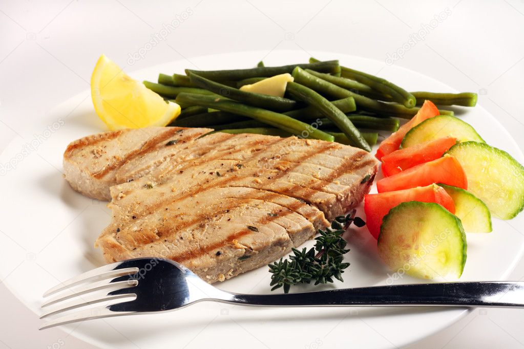 Grilled tuna meal with fork