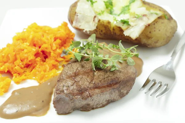 Filet mignon meal with fork — Stock Photo, Image