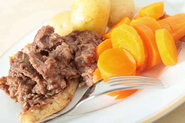 Steak and kidney pudding meal — Stock Photo, Image