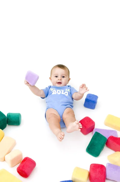 Dítě s hračkami — Stock fotografie
