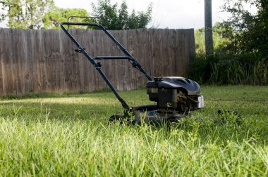 Lawn Mower on Grass clipart