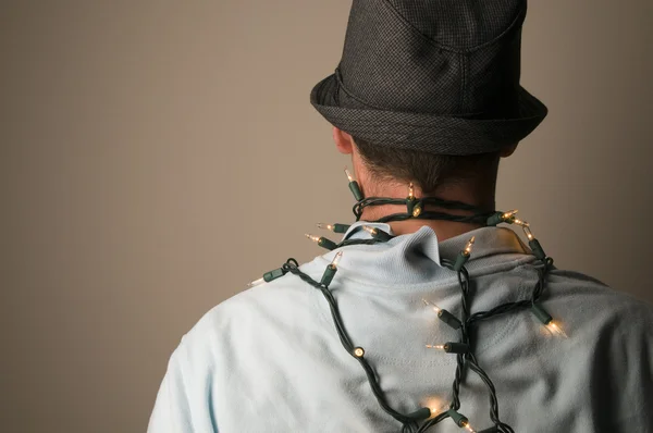 Male Wrapped in Christmas Lights — Stock Photo, Image