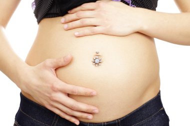 Belly of young pregnant woman with piercing clipart