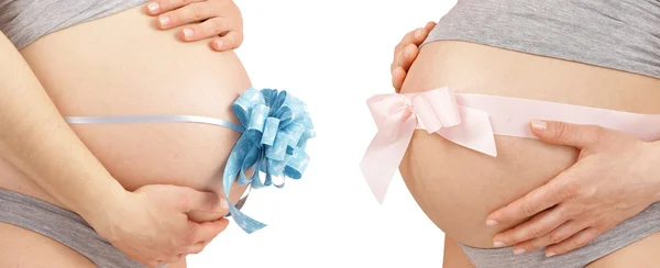 Two bellys with pink and blue bow — Stock Photo, Image