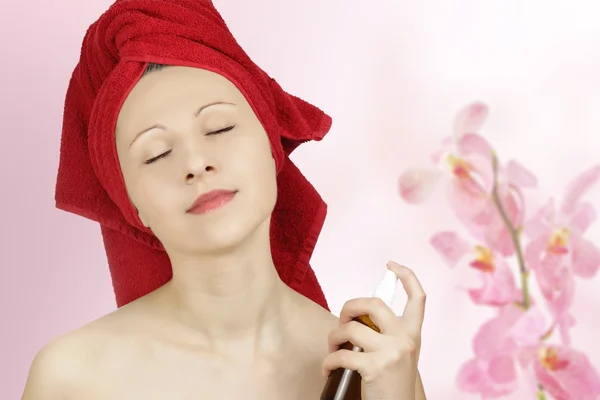 Woman pefuming after bath — Stock Photo, Image