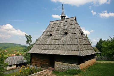 Traditional serbian house in ethno-village clipart