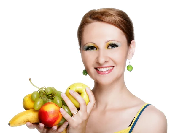 Young caucasian woman holding fruit — Stock Photo, Image