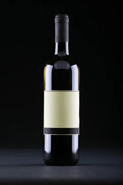 Studio shot of wine bottle with etiquette — Stock Photo, Image