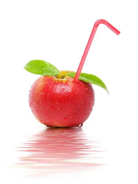 Червоне яблуко з соломою — стокове фото