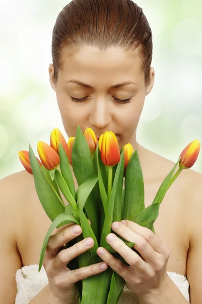 Young woman with tulips — Stock Photo, Image