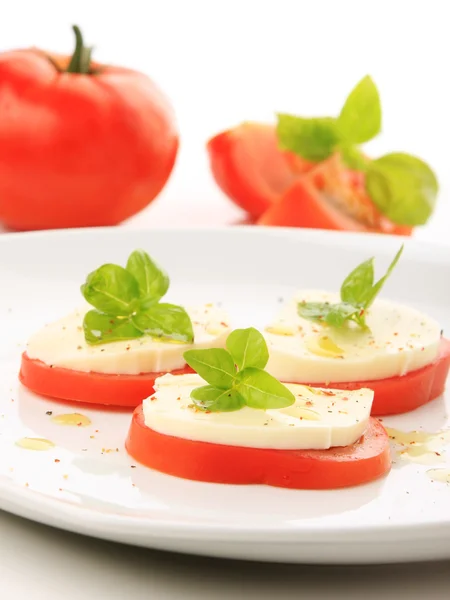 stock image Served tomato with mozzarella and basil