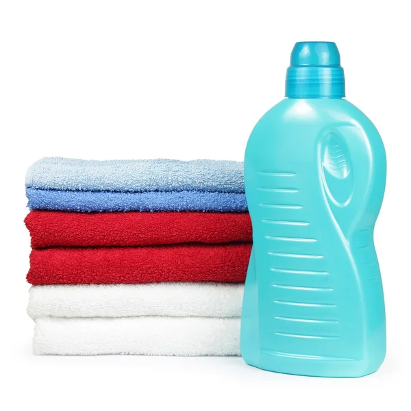 Towels and liquid laundry detergent — Stockfoto