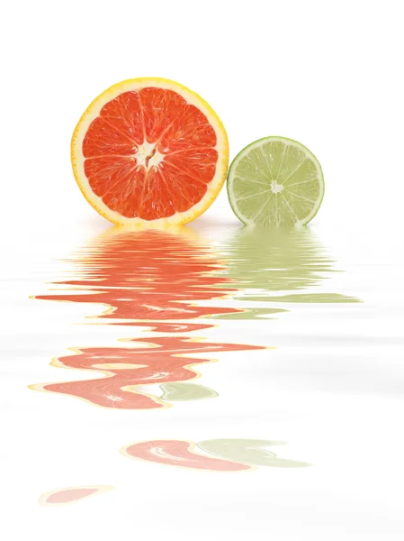 Orange and lime halves — Stock Photo, Image