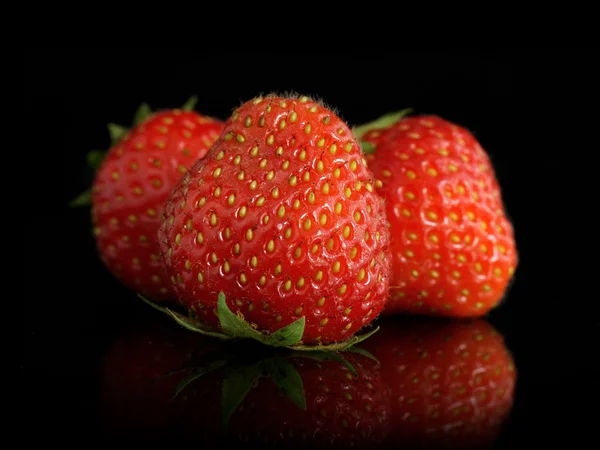 Tre jordbær - Stock-foto