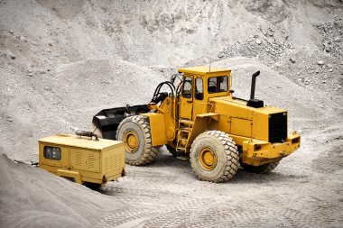 Buldozer in quarry clipart