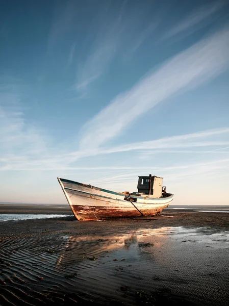 stock image Aground boat on the beach