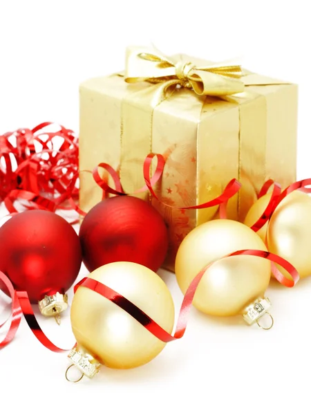 Golden box with christmas baubles — Stock Photo, Image
