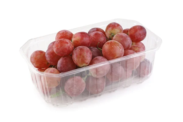Grape cluster in plastic container — Stock Photo, Image