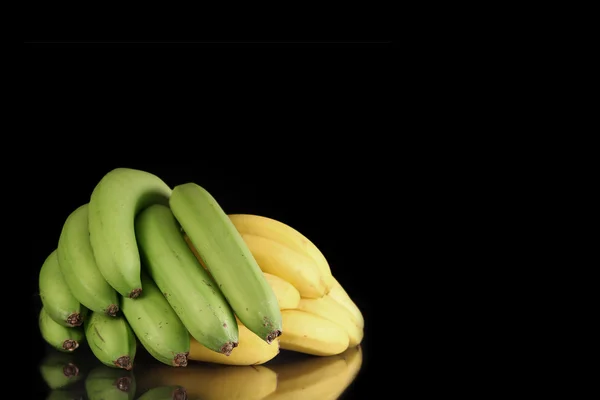 Banany zielone i żółte — Zdjęcie stockowe