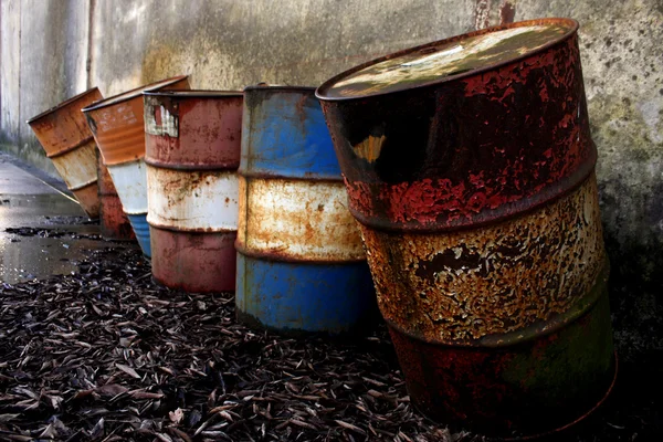 Abandoned rusty steel barrels — Stock Photo, Image