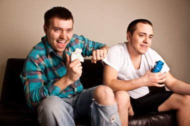 Two Guys Playing VG Fun clipart